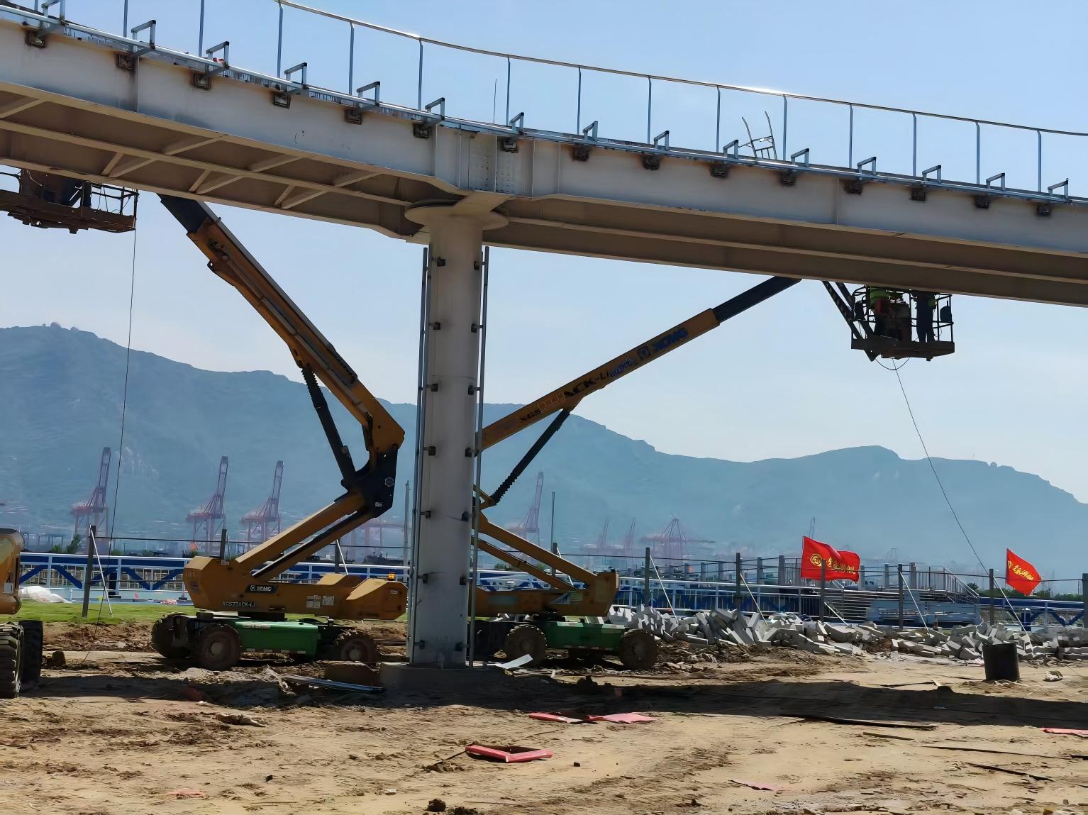 盐雾里搭起 “空中环线”！华体会·官方版网站登录入口高空作业平台奋战连岛景区建设